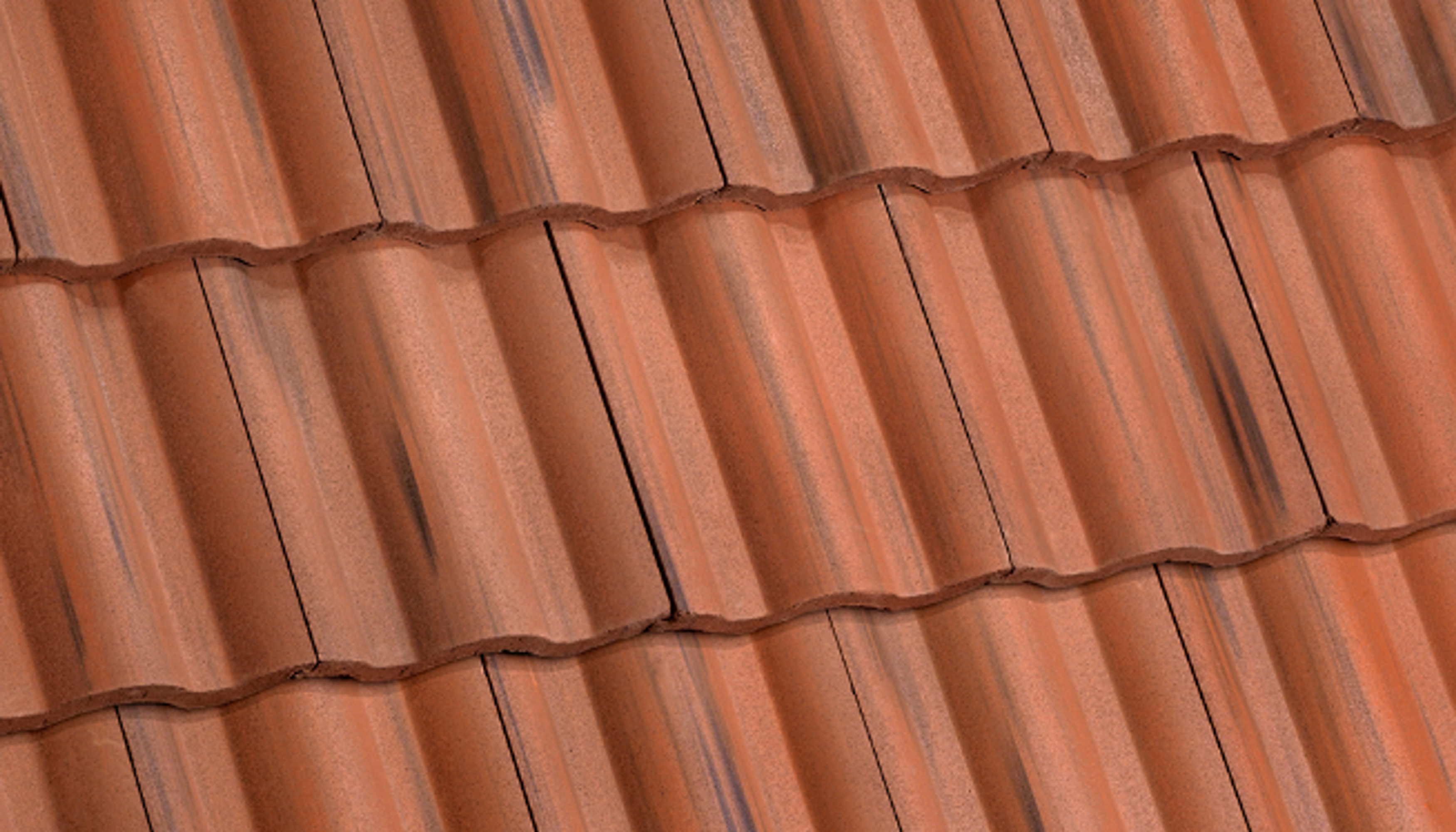 "Close-up of a red tile roof made of durable and aesthetically pleasing tile material for roofing."